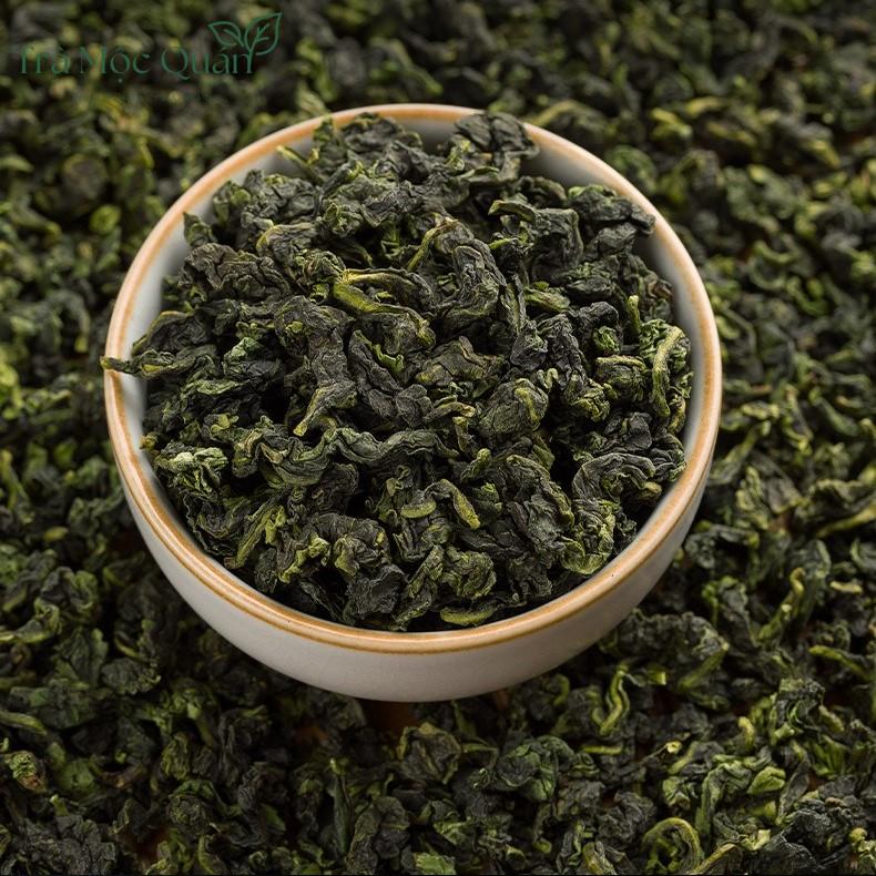 Trà Thiết Quan Âm – Hộp Quà Vali Vàng Kim Long 30 Hũ 420g QA54