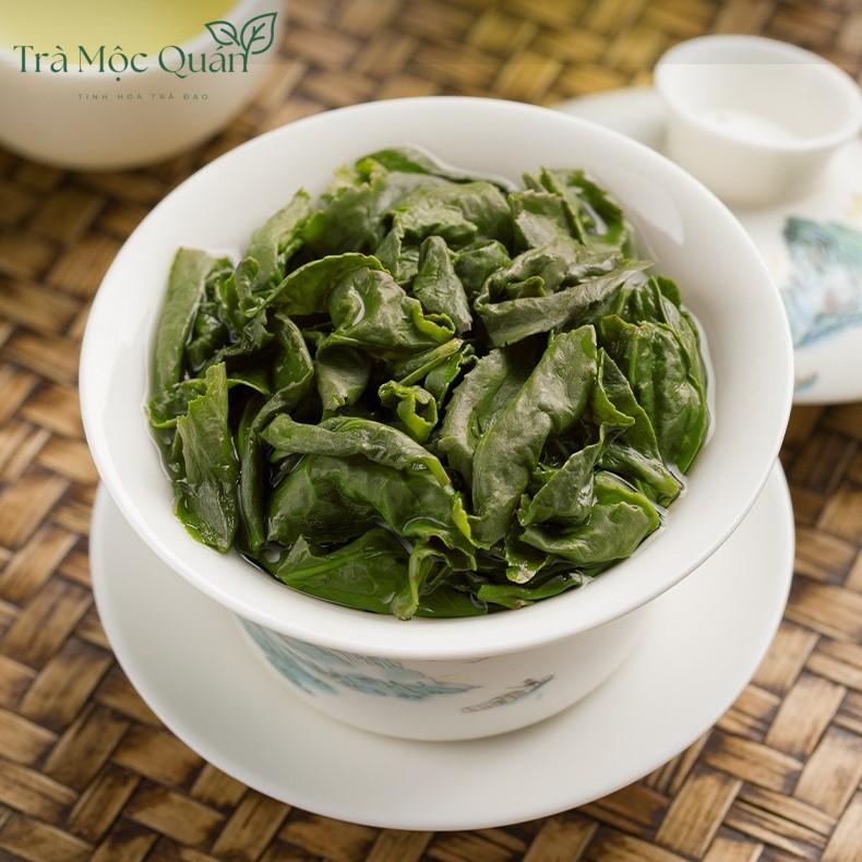 Trà Thiết Quan Âm – Hộp Quà Vali Vàng Kim Long 30 Hũ 420g QA54
